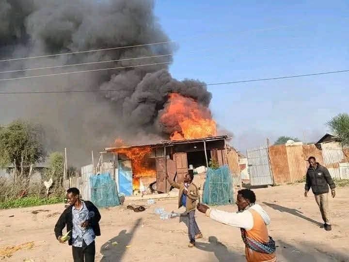 Jamuqa on fire after the forces set it ablaze.